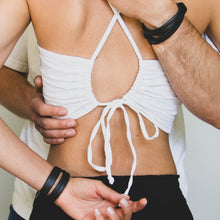 Load image into Gallery viewer, Unisex handcrafted leather double wrap bracelet. The bracelet features a sleek, minimalist design with premium upcycled leather and a convenient magnetic clasp. Available in two sizes