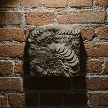 Load image into Gallery viewer, Handcrafted leather wall art featuring layered circular leather pieces in an organic, flowing pattern. A unique, dimensional decor piece designed for modern and contemporary interiors.