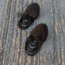 Load image into Gallery viewer, Black leather earrings with cascading shiny bead layers, featuring a textured finish and lightweight, modern design.