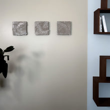 Load image into Gallery viewer, Handcrafted leather wall art featuring layered circular leather pieces in an organic, flowing pattern. A unique, dimensional decor piece designed for modern and contemporary interiors.