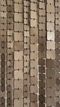 Load image into Gallery viewer, Minimalist wall hanging made of leather and wood, handcrafted and suspended, with freely hanging glossy leather strips catching light.