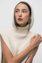Load image into Gallery viewer, Handcrafted earrings made from smooth beige leather with a bold, hand-cut black leopard pattern, featuring a dynamic shape for a sleek and modern look. Lightweight and versatile, perfect for an edgy yet refined style.