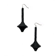Load image into Gallery viewer, Close-up of Axis dangle earrings made with upcycled leather in modern sculptural design.