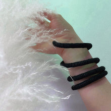 Load image into Gallery viewer, WAIWAI modern ethically handcrafted leather wide cuff black bracelet, minimal design, soft, lightweight and comfortable sustainable leather jewelry, reclaimed leather wrist bracelet, contemporary design, handmade in Vancouver, Bc, Canada