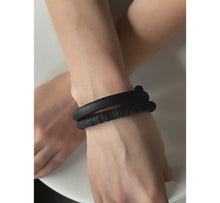 Load image into Gallery viewer, Unisex leather bracelet carefully and ethically handcrafted from leather scraps, modern and stylish men and women bracelet, fits any size