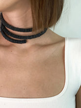 Load image into Gallery viewer, Discover the perfect blend of bold simplicity and high texture with WAIWAI's softest choker. The intriguing design of this helical choker symbolizes growth, evolution, and resilience. It flexes easily for comfortable wear, and its clasp-free design ensures clean lines from every angle. Experience the serpentine embrace of this choker's softness against your skin and forget it's even there. Elevate your jewelry collection with WAIWAI's unique and comfortable choker.