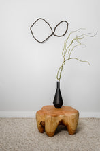 Load image into Gallery viewer, Made from upcycled leather, this unique wall decor piece allows you to unleash your creativity and design a personalized look for your home. Its flexibility enables you to adjust it to match your interior design and mood, giving you the freedom to experiment with different shapes and arrangements. With no hooks or fixtures required, installation is easy and hassle-free. Lightweight and easy to care for, this piece is sure to be an eye-catching focal point in any room.