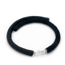 Load image into Gallery viewer, Hand-stitched with smooth leather tube on one side and textured leather sequins on the other. Featuring a vitreous lustre, clear quartz helps to declutter the mind, body, and spirit to create clarity and focus around a desire, allowing you to amplify your inner power and live, laugh, and love to your fullest potential. Made by WAIWAI, this choker is the softest, lightest, and most comfortable you will ever wear, with absolutely no resistance against your neck.