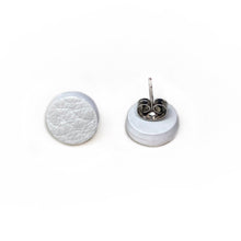 Load image into Gallery viewer, Uncomplicated and effortless, our leather stud earrings are a modern classic. Texture, softness, and sophistication in a tiny package. Appreciate the small things and enhance any outfit. Shop now and elevate your style with simplicity.