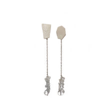 Load image into Gallery viewer, Add a touch of modern elegance to your wardrobe with our unique drop earrings. Crafted with clear quartz and featuring asymmetrical geometry, these earrings are perfect for fashion-forward women who appreciate design and art. The streamlined simplicity of our earrings will make you feel elegant and statuesque, while the lightweight design ensures all-day comfort. Shop now for a statement piece that promotes clarity and focus in the mind, body, and spirit