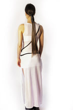 Load image into Gallery viewer, Elevate your style with our bold and modern extra-long necklace. Crafted with genuine leather disks ranging from 6-14mm and cotton waxed cord, it's a true statement piece that challenges the ideals of traditional accessories. Wear it as is or get creative by draping it around your waist or creating a crossed pattern. This disruptor of a necklace is sure to turn heads and start conversations. Shop now for a minimalistic yet eye-catching addition to your high-fashion wardrobe.