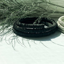 Load image into Gallery viewer, Discover the perfect blend of bold simplicity and high texture with WAIWAI's softest choker. The intriguing design of this helical choker symbolizes growth, evolution, and resilience. It flexes easily for comfortable wear, and its clasp-free design ensures clean lines from every angle. Experience the serpentine embrace of this choker's softness against your skin and forget it's even there. Elevate your jewelry collection with WAIWAI's unique and comfortable choker.