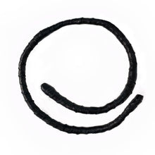 Load image into Gallery viewer, This genuine leather choker/bracelet hybrid lets you express your individuality and set your own standards of fashion. Wear it as a statement piece around your neck or wrist, or create customizable patterns for a unique look every time. Meticulously crafted with genuine leather wrapped around metal wire, this daring accessory is built to last. Be bold, be different, and let the Rebel Coil take your style to the next level.