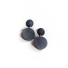 Load image into Gallery viewer, Effortlessly chic minimalist earrings in earthy tones. Basic shapes & delicate leather grain add subtle character. Suspended circles symbolize wholeness & promote a state of calm. Perfect for modernizing any outfit.