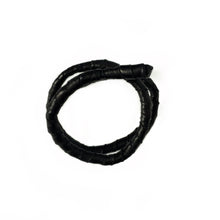 Load image into Gallery viewer, This genuine leather choker/bracelet hybrid lets you express your individuality and set your own standards of fashion. Wear it as a statement piece around your neck or wrist, or create customizable patterns for a unique look every time. Meticulously crafted with genuine leather wrapped around metal wire, this daring accessory is built to last. Be bold, be different, and let the Rebel Coil take your style to the next level.