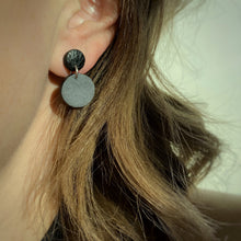 Load image into Gallery viewer, Effortlessly chic minimalist earrings in earthy tones. Basic shapes & delicate leather grain add subtle character. Suspended circles symbolize wholeness & promote a state of calm. Perfect for modernizing any outfit.