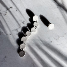 Load image into Gallery viewer, Elevate your style with a modern, asymmetric long mono earring. Lightweight and luxuriously soft, this flowy earring adds sophistication to any look, from elegant to casual. Embrace the beauty of imperfection and asymmetry for a confident, carefree expression. Comes with a single leather stud for a simple yet captivating design.
