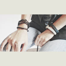 Load image into Gallery viewer, Feel strong and powerful with this versatile piece of convertible jewelry. Cleverly-designed clasps and rings allow for multiple ways of wearing, including as a wrap bracelet. The chain is detachable and can be worn separately or doubled up. Meticulous hand-stitching showcases the superb craftsmanship. Unapologetically push your boundaries with this transformative piece.