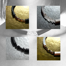 Load image into Gallery viewer, Our hand-stitched white leather choker with pyrite crystals embodies empowerment anchored by serenity. Pyrite deflects negative energy and promotes physical healing and mental strength. Complement any outfit with this choker that is soft, comfortable, and easy to wear. Shop now and feel empowered both inside and out.
