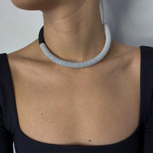 Load image into Gallery viewer, Made from individually punched genuine leather sequins and stainless steel memory wire, this choker is the softest, lightest, and most comfortable choker you will ever wear. It flexes easily to put on and adjusts to neck size, with absolutely no resistance against your neck, allowing you to forget its presence. With no clasp, this choker can be worn with the opening at the front.