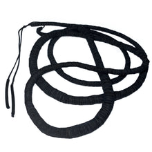 Load image into Gallery viewer, Elevate your style with our bold and modern extra-long necklace. Crafted with genuine leather disks ranging from 6-14mm and cotton waxed cord, it's a true statement piece that challenges the ideals of traditional accessories. Wear it as is or get creative by draping it around your waist or creating a crossed pattern. This disruptor of a necklace is sure to turn heads and start conversations. Shop now for a minimalistic yet eye-catching addition to your high-fashion wardrobe.