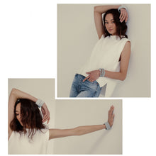 Load image into Gallery viewer, Elevate your style with this statement cuff bracelet that symbolizes growth, resilience, and strength. Made with individually hand-punched genuine leather sequins and stainless steel memory wire, this cuff is soft, lightweight, and comfortable for all-day wear. Adjust the diameter to your wrist size or stretch out the length to your imagination. Make a bold fashion statement with this unique and eye-catching accessory.