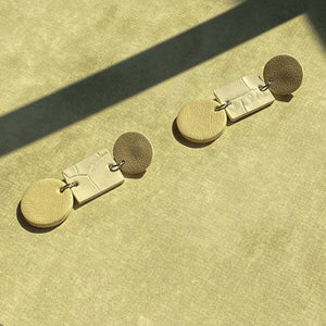 Introducing 'Texture Fusion ' earrings. A blend of smooth leather circles and an alligator rectangle, creating a captivating texture mix. Comfortable, stylish stud drop design. Embrace sustainable sophistication. WAIWAI