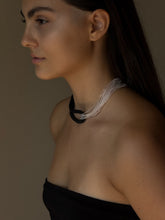 Load image into Gallery viewer, Model wearing black leather and clear glass bead choker, sculptural interlocking necklace by WAIWAI