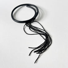 Load image into Gallery viewer, Black leather choker with black beaded tassel, showcasing a versatile design that can be worn in multiple ways.