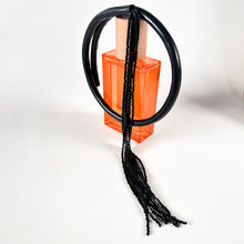 Load image into Gallery viewer, Black leather choker with black beaded tassel, showcasing a versatile design that can be worn in multiple ways.