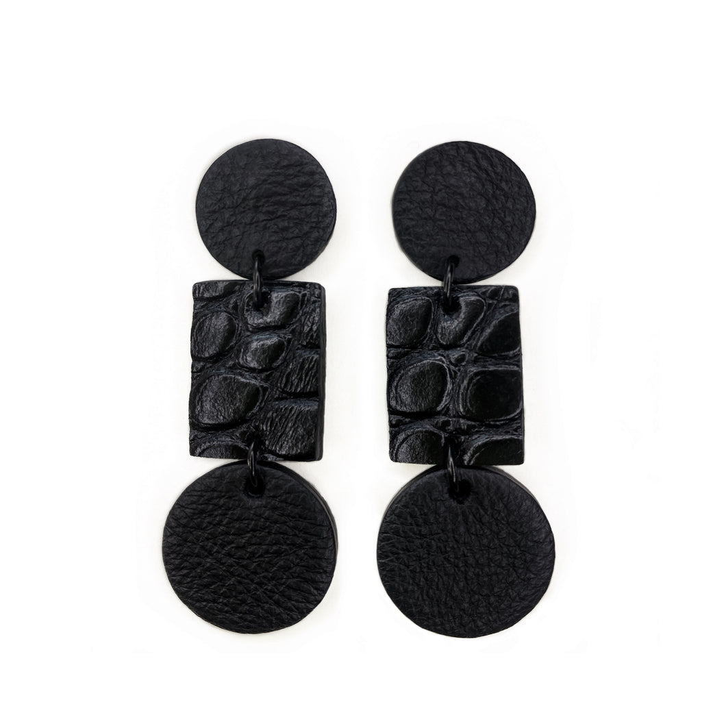 Introducing 'Texture Fusion ' earrings. A blend of smooth leather circles and an alligator rectangle, creating a captivating texture mix. Comfortable, stylish stud drop design. Embrace sustainable sophistication. WAIWAI