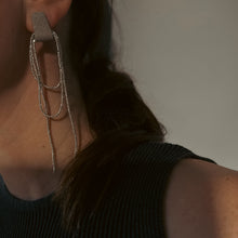 Load image into Gallery viewer, Explore our Beaded Bliss Studs: ethically handcrafted leather earrings adorned with shimmering strands of petite beads. Elevate your style sustainably with these captivating accessories.