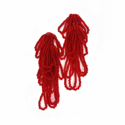 Cascading red beaded earrings with hand‑stitched strands on a leather base, handmade by WAIWAI.
