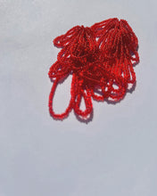 Load image into Gallery viewer, Cascading red beaded earrings with hand‑stitched strands on a leather base, handmade by WAIWAI.