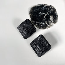 Load image into Gallery viewer, Square black leather earrings with rounded corners, featuring layered leather design for a dimensional and sculptural look.