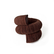 Load image into Gallery viewer, Handcrafted bracelet made from upcycled leather in a rich brown tone, featuring a sculptural and layered design with a unique spiral form.