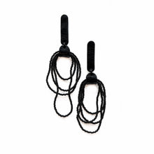 Load image into Gallery viewer, Pair of Noir Cascade earrings featuring black Japanese glass beads cascading in layered strands, combined with soft black leather accents for a bold and elegant look.