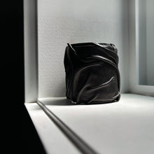 Load image into Gallery viewer, A handcrafted Ripple Leather Cuff featuring a wide, wave-inspired design made from soft, genuine leather. The cuff wraps comfortably around the wrist, showcasing its unique texture and bold style.