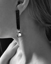 Load image into Gallery viewer, Model wearing AXIS long leather earrings with clear quartz, lightweight minimalist statement earrings