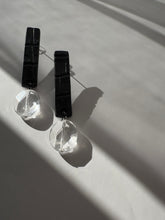 Load image into Gallery viewer, Close-up of natural clear quartz bead on black alligator-textured leather earrings, minimalist handcrafted earrings