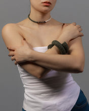 Load image into Gallery viewer, Model wearing minimal structured leather choker in off white and green with natural stone detail 