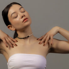 Load image into Gallery viewer, Model wearing minimal structured leather choker in off white and green with natural stone detail 