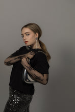 Load image into Gallery viewer, Long sculptural earrings handcrafted from reclaimed leather with strands of transparent silver-lined Japanese glass beads and stainless steel posts.