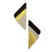 Load image into Gallery viewer, A pair of geometric statement earrings made from layered textured leather triangles in dark brown, textured gold, and light beige, shown on a plain white background.