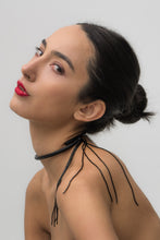 Load image into Gallery viewer, Black leather choker with black beaded tassel, showcasing a versatile design that can be worn in multiple ways.