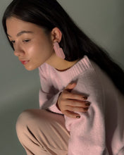 Load image into Gallery viewer, Layered pink leather earrings with rounded geometric shapes on a model