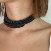 Load image into Gallery viewer, Discover the perfect blend of bold simplicity and high texture with WAIWAI&#39;s softest choker. The intriguing design of this helical choker symbolizes growth, evolution, and resilience. It flexes easily for comfortable wear, and its clasp-free design ensures clean lines from every angle. Experience the serpentine embrace of this choker&#39;s softness against your skin and forget it&#39;s even there. Elevate your jewelry collection with WAIWAI&#39;s unique and comfortable choker.