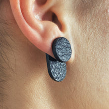 Load image into Gallery viewer, the upcycled leather earrings with the double-sided second part behind the earlobe for a distinctive look
