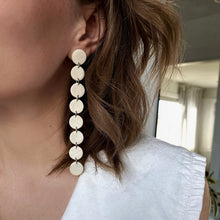 Load image into Gallery viewer, Elevate your style with a modern, asymmetric long mono earring. Lightweight and luxuriously soft, this flowy earring adds sophistication to any look, from elegant to casual. Embrace the beauty of imperfection and asymmetry for a confident, carefree expression. Comes with a single leather stud for a simple yet captivating design.