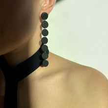 Load image into Gallery viewer, Elevate your style with a modern, asymmetric long mono earring. Lightweight and luxuriously soft, this flowy earring adds sophistication to any look, from elegant to casual. Embrace the beauty of imperfection and asymmetry for a confident, carefree expression. Comes with a single leather stud for a simple yet captivating design.